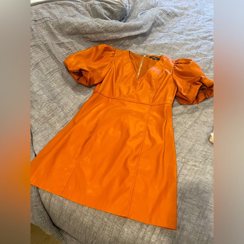 Orange leather dress!